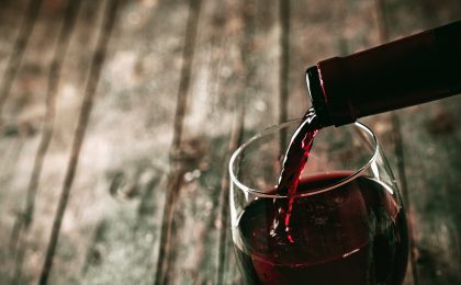 Pouring red wine