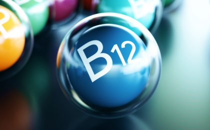 Vitamin B12, on black cue ball