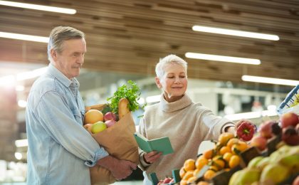 Senior Couple Grocery Shopping at Farmers Market